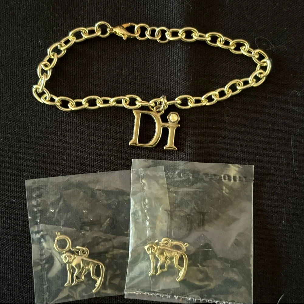 Diamond International Gold Charm Bracelet Set. 8 bracelets multiple charms. - Picture 8 of 15